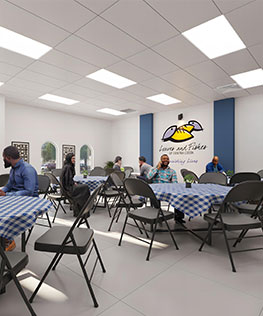 Guests gathered in a Loaves and Fishes dining room